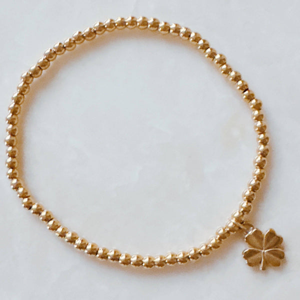 Golden Ball Single Charm Stretch Bracelet: Simply Cross