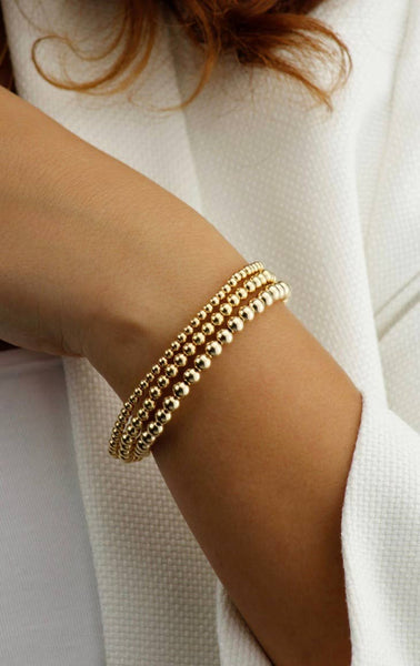 Gold Beads Bracelets- 14K Gold Steel Bead Stretch Bracelets: Yellow Gold / 6mm