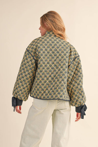 FLORAL QUILTED JACKET WITH RIBBON SLEEVE DETAIL MJK4432: Navy Teal Multi Floral / S