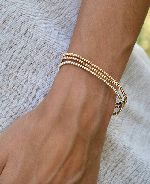 Gold Beads Bracelets- 14K Gold Steel Bead Stretch Bracelets: Yellow Gold / 6mm