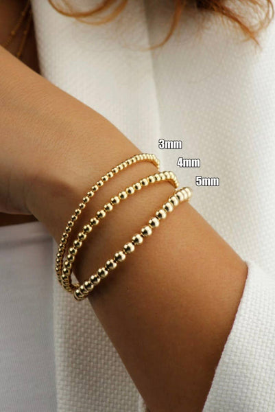 Gold Beads Bracelets- 14K Gold Steel Bead Stretch Bracelets: Yellow Gold / 6mm
