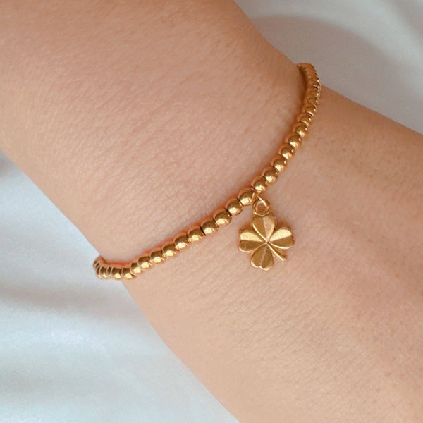 Golden Ball Single Charm Stretch Bracelet: Magic Key