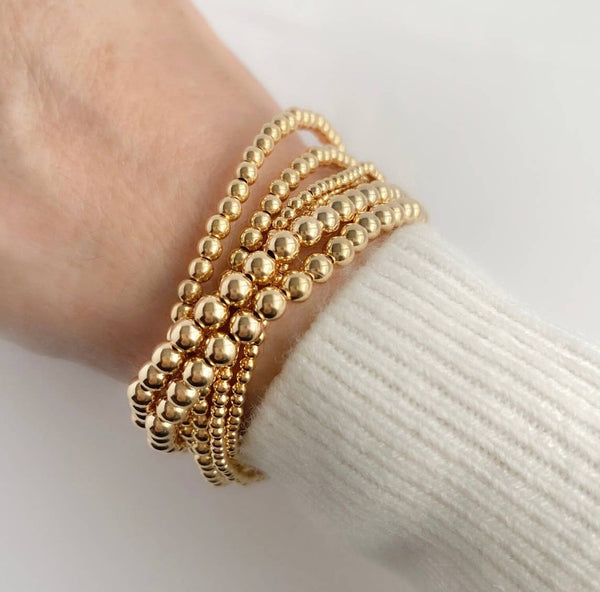 Gold Beads Bracelets- 14K Gold Steel Bead Stretch Bracelets: Yellow Gold / 6mm